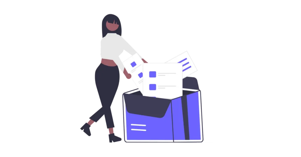 A person loading up a box with files